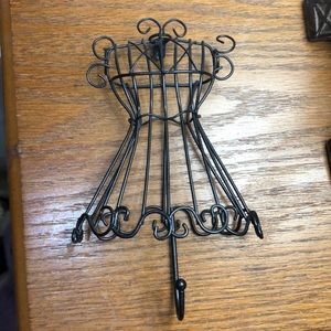 Three black accessory hooks